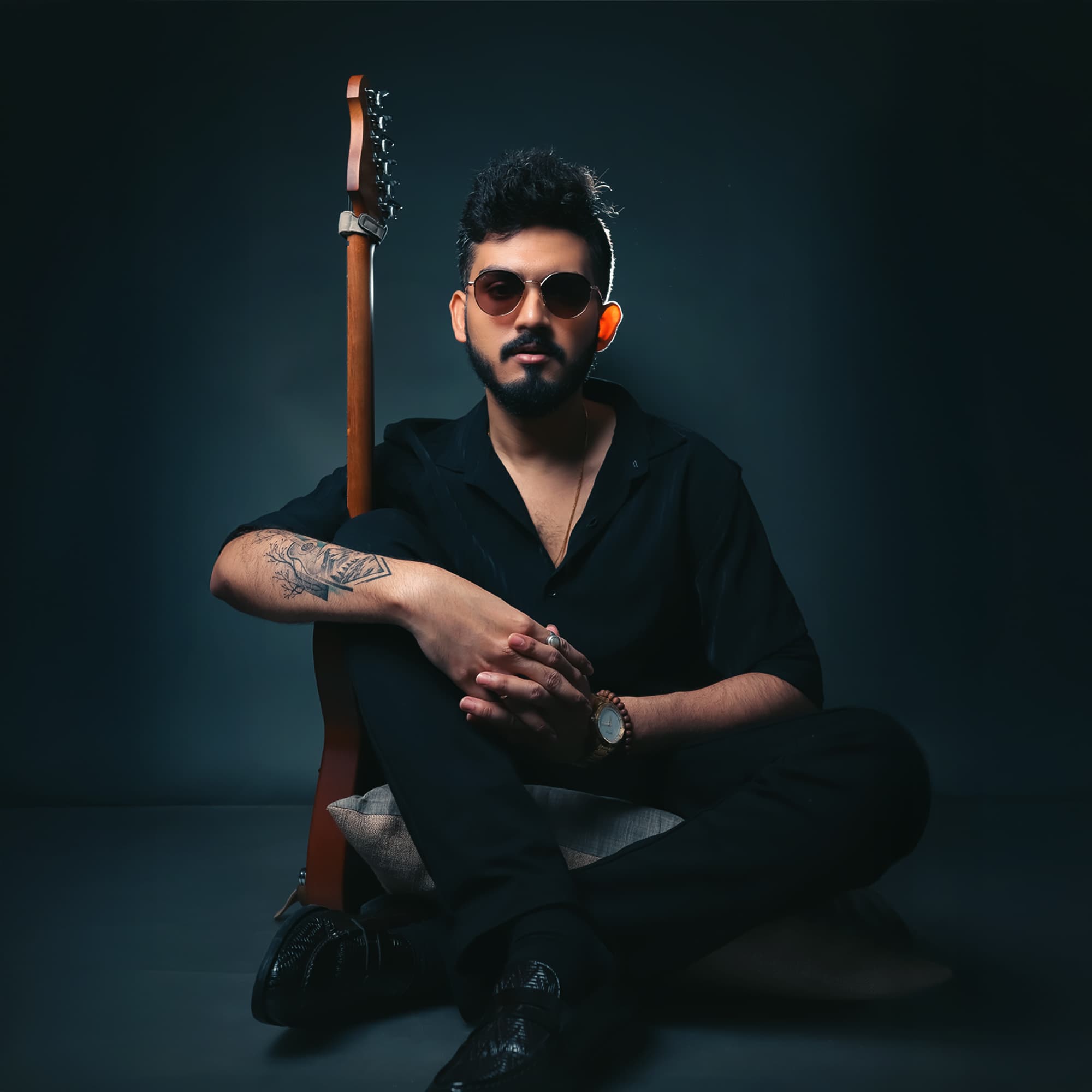 Shuvam Raha playing guitar